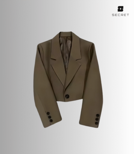 Women's solid color long sleeve suit jacket with turn-down collar, made from spandex fabric.