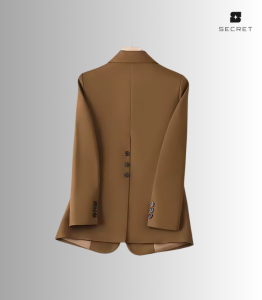 Women's white double-breasted blazer with long sleeves and turn-down collar, made from polyester and spandex blend.
